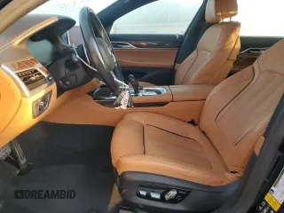 2020 BMW 7 Series 750i xDrive with VIN WBA7U2C0XLGM27270, listed as a Copart auction lot 77241404 with 68,998 mi miles and Salvage Title. Bid and sale history available at carsss.com. Image 7.
