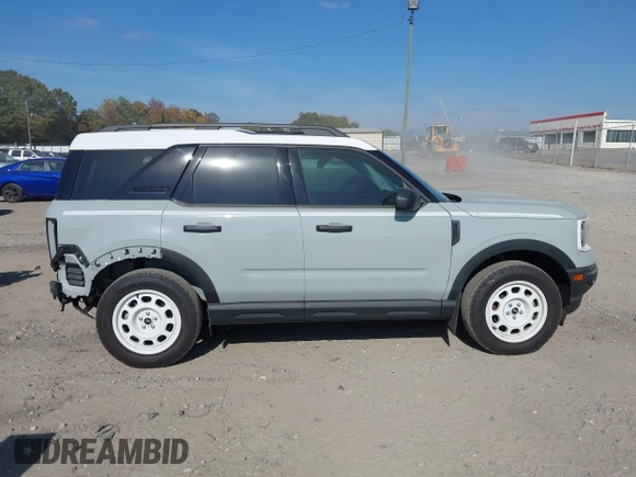 2023 Ford Bronco Sport Heritage z VIN 3FMCR9G61PRD08589, wystawiony jako IAAI lot #40706185 z przebiegiem 150 000 mil mil oraz . Historia ofert i sprzedaży dostępna na DreamBid. Obrazek 14.