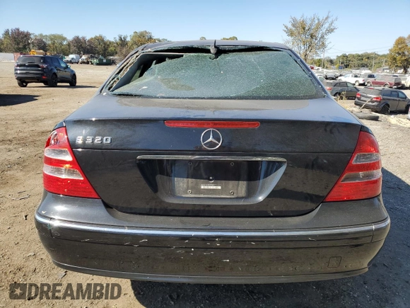 2003 Mercedes-Benz E-Class 3.2L with VIN WDBUF65J03A281430, listed as a Copart auction lot 77086054 with 121,080 mi miles and Salvage Title. Bid and sale history available at carsss.com. Image 6.