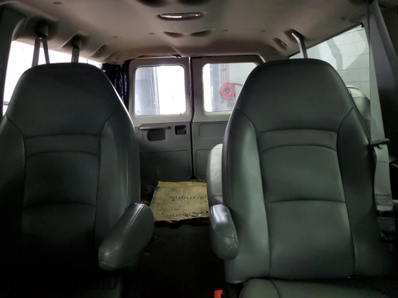 2008 Ford Econoline Passenger XL with VIN 1FMNE11L18DB43562, listed as a Copart auction lot 50723515 with 143,874 mi miles and Salvage Title. Bid and sale history available at carsss.com. Image 10.
