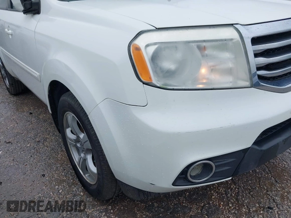 2015 Honda Pilot EX-L with VIN 5FNYF4H56FB061663, listed as a IAAI auction lot 41873152 with 211,876 mi miles and . Bid and sale history available at carsss.com. Image 18.