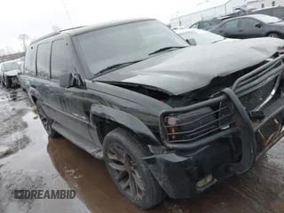 2000 Cadillac Escalade z VIN 1GYEK63R8YR188250, wystawiony jako IAAI lot #41412615 z przebiegiem 190 542 mil mil oraz . Historia ofert i sprzedaży dostępna na DreamBid. Obrazek 1.