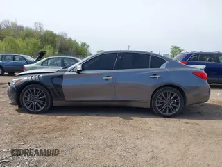 2016 Infiniti Q50 3.0t Red Sport 400 with VIN JN1FV7AR8GM451720, listed as a IAAI auction lot 42163857 with 122,158 mi miles. Bid and sale history available at carsss.com. Image 14.