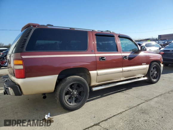 2000 Chevrolet Suburban LT with VIN 3GNEC16T0YG204106, listed as a Copart auction lot 82812134 with 211,674 mi miles and Salvage Title. Bid and sale history available at carsss.com. Image 3.