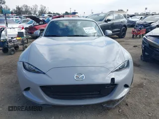 2024 Mazda MX-5 Miata Grand Touring z VIN JM1NDAM76R0602860, wystawiony jako IAAI lot #41346197 z przebiegiem 1 891 mil mil oraz . Historia ofert i sprzedaży dostępna na DreamBid. Obrazek 12.