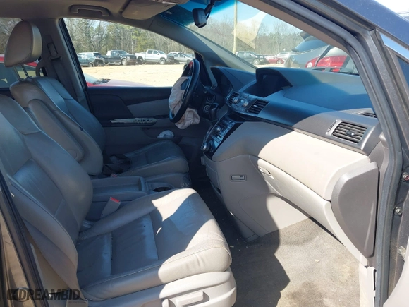2012 Honda Odyssey EX-L with VIN 5FNRL5H64CB066240, listed as a IAAI auction lot 41792321 with 186,895 mi miles. Bid and sale history available at carsss.com. Image 5.