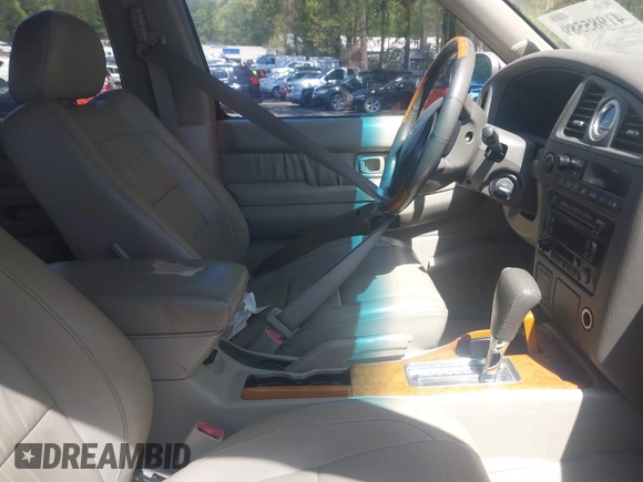 2002 Infiniti QX4 with VIN JNRDR09X52W213906, listed as a IAAI auction lot 41985589 with 166,733 mi miles and . Bid and sale history available at DreamBid. Image 5.