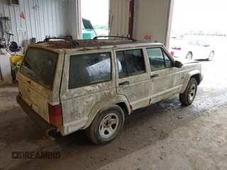 1996 Jeep Cherokee Sport with VIN 1J4FJ68S7TL263437, listed as a IAAI auction lot 42513022 with 158,561 mi miles and . Bid and sale history available at DreamBid. Image 4.