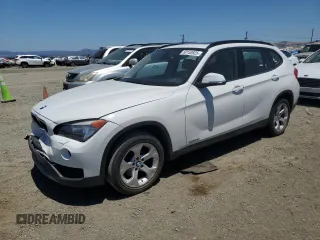 2014 BMW X1 sDrive28i z VIN WBAVM1C51EVW51832, wystawiony jako Copart lot #60153925 z przebiegiem 101 781 mil mil oraz Szkoda całkowita • Salvage title. Historia ofert i sprzedaży dostępna na DreamBid. Obrazek 1.