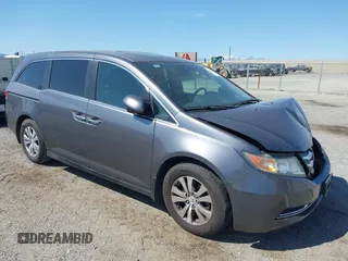2014 Honda Odyssey EX-L with VIN 5FNRL5H67EB096027, listed as a IAAI auction lot 41950398 with 147,158 mi miles and . Bid and sale history available at carsss.com. Image 1.