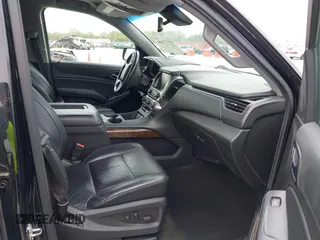 2016 Chevrolet Suburban LT z VIN 1GNSKHKC7GR315884, wystawiony jako IAAI lot #41977108 z przebiegiem 138 902 mil mil oraz . Historia ofert i sprzedaży dostępna na DreamBid. Obrazek 5.