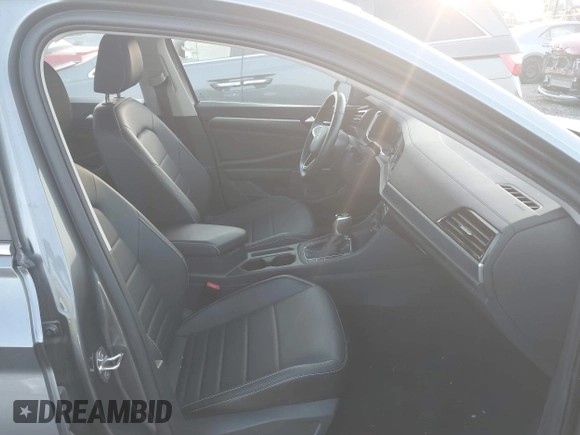2023 Volkswagen Jetta SE with VIN 3VW7M7BUXPM012396, listed as a IAAI auction lot 42073638 with 24,593 mi miles and . Bid and sale history available at DreamBid. Image 5.