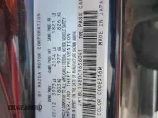 2012 Mazda 3 i Touring z VIN JM1BL1V80C1656041, wystawiony jako Copart lot #55286495 z przebiegiem 83 041 mil mil oraz Szkoda całkowita • Salvage title. Historia ofert i sprzedaży dostępna na DreamBid. Obrazek 12.