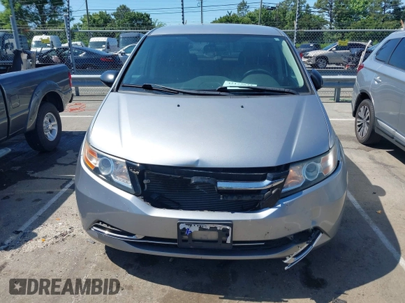 2016 Honda Odyssey LX z VIN 5FNRL5H22GB092614, wystawiony jako IAAI lot #42173633 z przebiegiem 159 387 mil mil oraz . Historia ofert i sprzedaży dostępna na DreamBid. Obrazek 12.