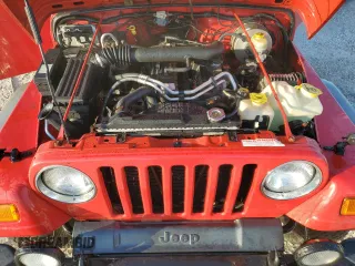 2003 Jeep Wrangler Sport with VIN 1J4FA49S43P332645, listed as a Copart auction lot 77424814 with 165,909 mi miles and Non Repairable. Bid and sale history available at carsss.com. Image 12.