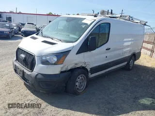 2023 Ford Transit Cargo z VIN 1FTYE1Y81PKB53926, wystawiony jako IAAI lot #42514906 z przebiegiem 52 410 mil mil oraz . Historia ofert i sprzedaży dostępna na DreamBid. Obrazek 21.