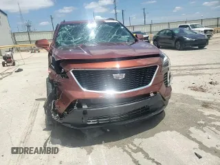 2020 Cadillac XT4 FWD Sport z VIN 1GYFZER45LF025992, wystawiony jako Copart lot #60110325 z przebiegiem 43 820 mil mil oraz Szkoda całkowita • Salvage title. Historia ofert i sprzedaży dostępna na DreamBid. Obrazek 14.