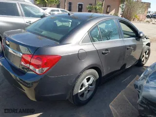 2014 Chevrolet Cruze 1LT with VIN 1G1PC5SB6E7134651, listed as a IAAI auction lot 41764403 with 177,122 mi miles. Bid and sale history available at carsss.com. Image 4.