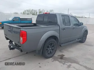 2020 Nissan Frontier SV with VIN 1N6ED0EA2LN701042, listed as a IAAI auction lot 41865224 with 67,910 mi miles and . Bid and sale history available at DreamBid. Image 4.