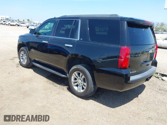 2015 Chevrolet Tahoe LT with VIN 1GNSCBKC8FR612607, listed as a IAAI auction lot 42099907 with 138,037 mi miles and . Bid and sale history available at DreamBid. Image 3.