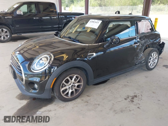 2021 MINI Hardtop Cooper with VIN WMWXR3C0XM2N93195, listed as a IAAI auction lot 42083421 with 46,269 mi miles and . Bid and sale history available at DreamBid. Image 2.