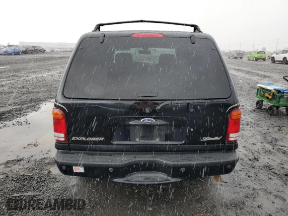 2000 Ford Explorer Limited with VIN 1FMDU75EXYZA76329, listed as a Copart auction lot 80952474 with 90,637 mi miles and Salvage title. Bid and sale history available at DreamBid. Image 6.