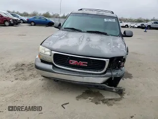 2002 GMC Yukon SLE z VIN 1GKEC13V52J192656, wystawiony jako Copart lot #46674605 z przebiegiem 258 336 mil mil oraz Szkoda całkowita • Salvage title. Historia ofert i sprzedaży dostępna na DreamBid. Obrazek 12.