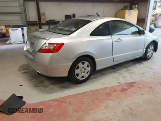 2006 Honda Civic Cpe LX with VIN 2HGFG126X6H532696, listed as a IAAI auction lot 42016264 with 209,509 mi miles. Bid and sale history available at carsss.com. Image 4.