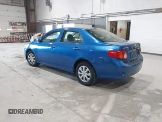 2009 Toyota Corolla with VIN JTDBL40E699037792, listed as a IAAI auction lot 41838231 with 199,690 mi miles. Bid and sale history available at carsss.com. Image 3.