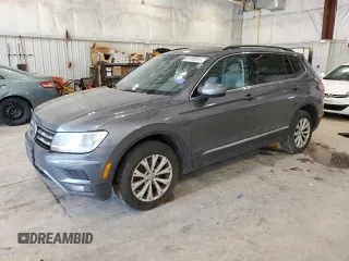 2018 Volkswagen Tiguan SEL z VIN 3VV2B7AX2JM027014, wystawiony jako Copart lot #62408815 z przebiegiem 131 053 mil mil oraz Czysty tytuł • Clean title. Historia ofert i sprzedaży dostępna na DreamBid. Obrazek 1.