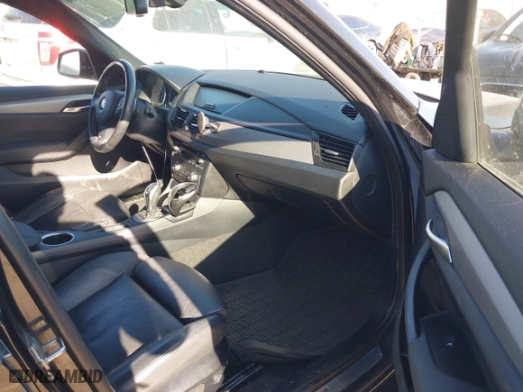 2014 BMW X1 xDrive28i with VIN WBAVL1C58EVY11143, listed as a IAAI auction lot 41396236 with 115,667 mi miles. Bid and sale history available at carsss.com. Image 5.