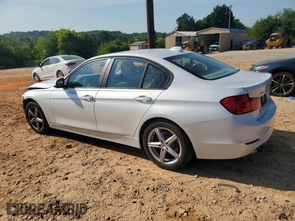 2014 BMW 3 Series 328i xDrive with VIN WBA3B5C51EF958576, listed as a Copart auction lot 62089375 with 148,140 mi miles and Salvage title. Bid and sale history available at DreamBid. Image 2.