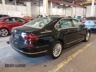 2017 Volkswagen Passat SE with VIN 1VWBT7A30HC019849, listed as a IAAI auction lot 42450723 with 73,236 mi miles and . Bid and sale history available at DreamBid. Image 4.