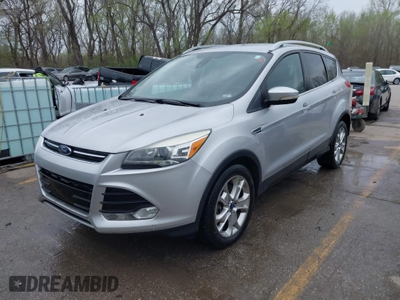 2015 Ford Escape Titanium with VIN 1FMCU9JX2FUA24279, listed as a IAAI auction lot 41930868 with 254,997 mi miles. Bid and sale history available at carsss.com. Image 2.