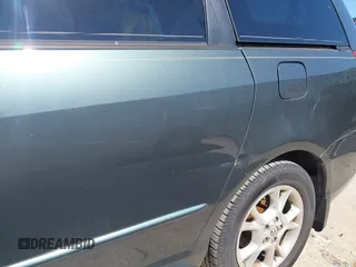 2004 Toyota Sienna XLE with VIN 5TDZA22C24S021779, listed as a IAAI auction lot 42091893 with 155,043 mi miles. Bid and sale history available at carsss.com. Image 6.