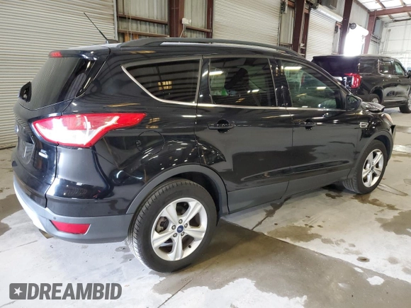 2016 Ford Escape SE with VIN 1FMCU9GX1GUC24692, listed as a Copart auction lot 88102815 with 114,900 mi miles and Salvage Title. Bid and sale history available at DreamBid. Image 3.