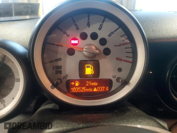 2010 MINI Convertible S with VIN WMWMS3C50ATY51636, listed as a Copart auction lot 66097715 with 103,525 mi miles and Salvage title. Bid and sale history available at DreamBid. Image 9.