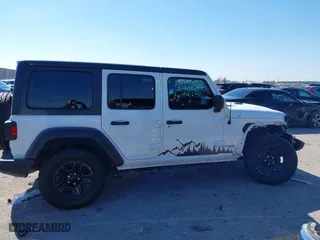 2018 Jeep Wrangler Unlimited Sport S with VIN 1C4HJXDG0JW140869, listed as a IAAI auction lot 41623256 with 112,197 mi miles. Bid and sale history available at carsss.com. Image 14.
