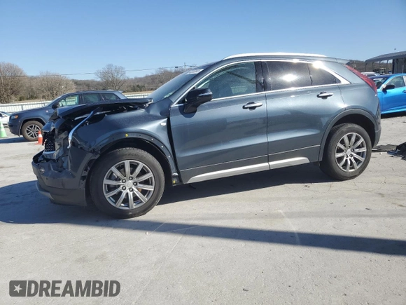 2021 Cadillac XT4 AWD Premium Luxury with VIN 1GYFZDR47MF002175, listed as a Copart auction lot 48303665 with 94,698 mi miles and Salvage Title. Bid and sale history available at carsss.com. Image 1.