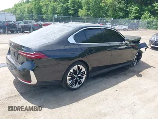 2024 BMW 5 Series 530i xDrive with VIN WBA53FJ01RCP69792, listed as a IAAI auction lot 42240736 with Not provided miles and . Bid and sale history available at DreamBid. Image 4.