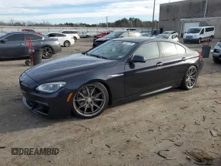 2014 BMW 6 Series 650i with VIN WBA6B2C51ED128896, listed as a Copart auction lot 84801734 with 142,181 mi miles and Salvage Title. Bid and sale history available at carsss.com. Image 1.
