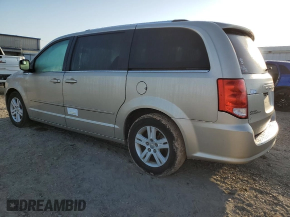 2013 Dodge Grand Caravan Crew with VIN 2C4RDGDG4DR567707, listed as a Copart auction lot 52731005 with 210,359 mi miles and Salvage Title. Bid and sale history available at DreamBid. Image 2.