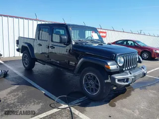 2023 Jeep Gladiator Overland with VIN 1C6HJTFG1PL521251, listed as a IAAI auction lot 42024592 with 44,403 mi miles. Bid and sale history available at carsss.com. Image 1.