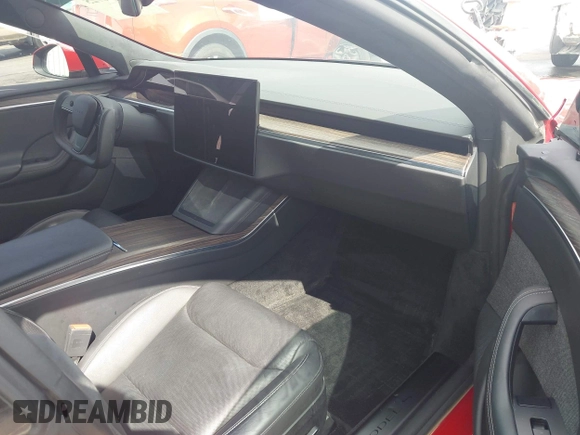 2021 Tesla Model S Plaid z VIN 5YJSA1E69MF439987, wystawiony jako IAAI lot #42496725 z przebiegiem 25 mil mil oraz . Historia ofert i sprzedaży dostępna na DreamBid. Obrazek 5.