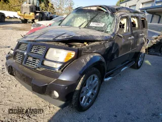 2011 Dodge Nitro Heat with VIN 1D4PU4GX4BW537857, listed as a Copart auction lot 71148623 with 129,599 mi miles and Salvage Title. Bid and sale history available at carsss.com. Image 1.