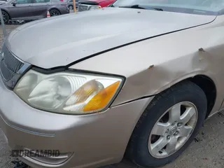 2002 Toyota Avalon XL with VIN 4T1BF28B72U206657, listed as a IAAI auction lot 42081198 with 1 mi miles. Bid and sale history available at carsss.com. Image 6.