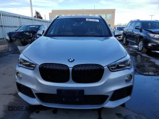 2016 BMW X1 xDrive28i with VIN WBXHT3C34G5E56071, listed as a Copart auction lot 68723182 with 74,488 mi miles. Bid and sale history available at carsss.com. Image 5.