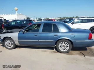 2009 Mercury Grand Marquis LS with VIN 2MEHM75V09X634393, listed as a IAAI auction lot 41993456 with 153,862 mi miles. Bid and sale history available at carsss.com. Image 14.