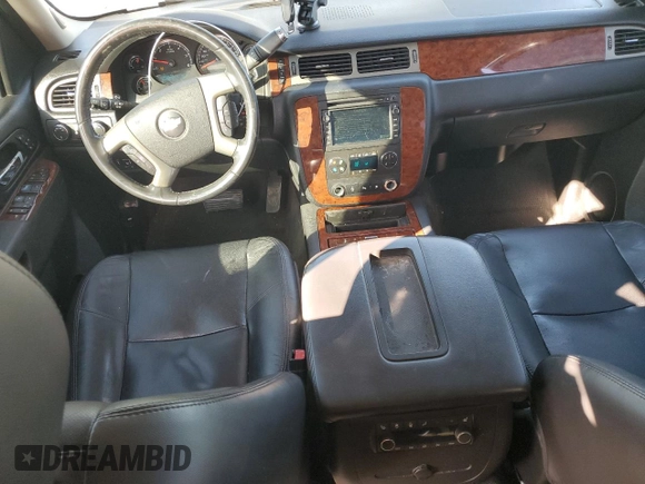 2010 Chevrolet Suburban LTZ with VIN 1GNUKKE37AR165641, listed as a Copart auction lot 88939935 with 203,190 mi miles and Salvage title. Bid and sale history available at DreamBid. Image 8.