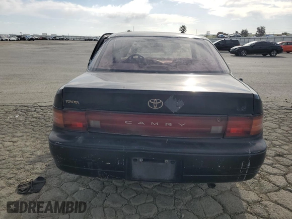 1993 Toyota Camry LE with VIN JT2SK12E4P0112014, listed as a Copart auction lot 52822095 with 249,458 mi miles and Salvage Title. Bid and sale history available at carsss.com. Image 6.